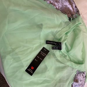 Cute mint green top with tags!